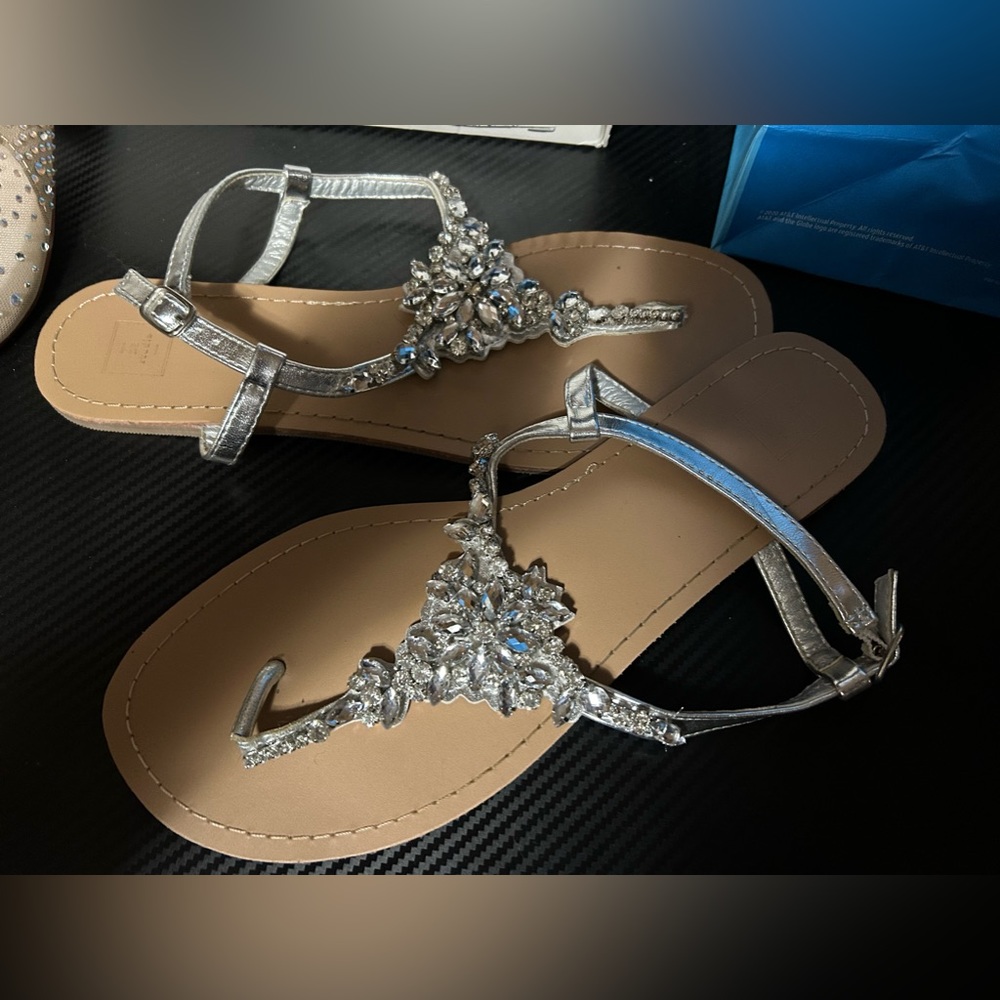 David’s Bridal - Size 11. Only worn once.